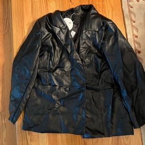 Needs ironing leather blazer!